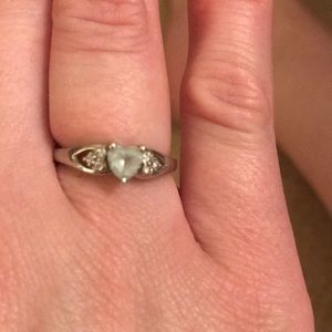 White gold ring with heart shaped stone